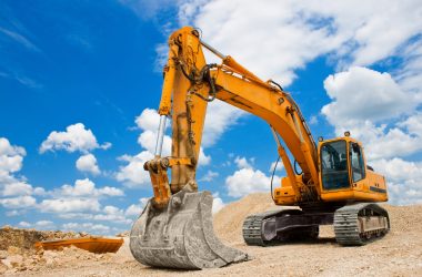 Yellow Excavator at Construction Site